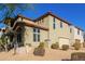 Two-story house with Spanish-style architecture and desert landscaping at 32405 N 23Rd Ave, Phoenix, AZ 85085