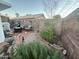 Landscaped backyard with gravel, plants, and a patio area at 4101 E Silverwood Dr, Phoenix, AZ 85048