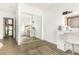 Bedroom with mirrored closet and vanity area at 5038 W Echo Ln, Glendale, AZ 85302