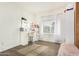 Bright bedroom with vanity and window seating at 5038 W Echo Ln, Glendale, AZ 85302