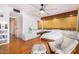 Main bedroom with wood floors and ceiling fan at 5038 W Echo Ln, Glendale, AZ 85302