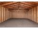 Spacious storage shed with wooden interior at 9042 E Marguerite Ave, Mesa, AZ 85208