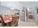 Cozy dining area with a wooden table and chairs at 10205 W Royal Oak Rd, Sun City, AZ 85351
