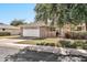 Ranch style home with a white garage door and landscaping at 10205 W Royal Oak Rd, Sun City, AZ 85351