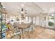 Covered patio with table, chairs, and ceiling fan at 10205 W Royal Oak Rd, Sun City, AZ 85351
