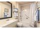 Bathroom featuring a bathtub, toilet, and vanity sink at 10728 W Cheryl Dr, Sun City, AZ 85351