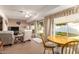 Small breakfast nook with a round wooden table and chairs at 10728 W Cheryl Dr, Sun City, AZ 85351