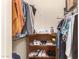 Well-organized closet with shelving and hanging rods at 10728 W Cheryl Dr, Sun City, AZ 85351