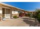 Front entry with walkway, landscaping, and a decorative gate at 10728 W Cheryl Dr, Sun City, AZ 85351