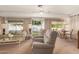 Spacious living room with access to the backyard at 10728 W Cheryl Dr, Sun City, AZ 85351