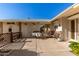 A cozy patio with a table and chairs, perfect for outdoor dining at 10728 W Cheryl Dr, Sun City, AZ 85351