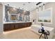 Luxurious bathroom with a soaking tub, double sinks, and a modern design at 11946 E Cavedale Dr, Scottsdale, AZ 85262