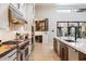 Gourmet kitchen with high-end appliances and ample counter space at 11946 E Cavedale Dr, Scottsdale, AZ 85262