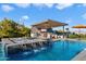 Resort-style pool and spa with waterfall feature at 11946 E Cavedale Dr, Scottsdale, AZ 85262