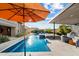 Relaxing pool area with patio and mountain views at 11946 E Cavedale Dr, Scottsdale, AZ 85262