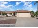 One-story home with attached garage and desert landscaping at 14102 W White Rock Dr, Sun City West, AZ 85375