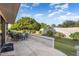 Flagstone patio with seating area, offering relaxing outdoor space at 14102 W White Rock Dr, Sun City West, AZ 85375