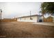 Large backyard with grassy area and wooden fence at 1501 W Grovers Ave, Phoenix, AZ 85023