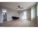 Bright bedroom with wood-look floors and access to a bathroom at 1501 W Grovers Ave, Phoenix, AZ 85023