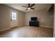Spacious bedroom with wood-look floors and a large window at 1501 W Grovers Ave, Phoenix, AZ 85023
