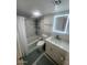 Clean bathroom with a bathtub, toilet and vanity at 3131 W Cochise Dr # 165, Phoenix, AZ 85051