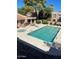 Inviting community pool with spa and comfortable lounge chairs at 3131 W Cochise Dr # 165, Phoenix, AZ 85051