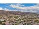 Aerial view of a luxury community nestled against mountain backdrop at 3234 E Ian Dr, Phoenix, AZ 85042