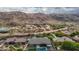 Aerial view of home with a large backyard and pool at 3234 E Ian Dr, Phoenix, AZ 85042
