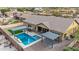Home with sparkling pool and two pergolas in backyard at 3234 E Ian Dr, Phoenix, AZ 85042