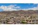 Aerial view showcasing homes and mountain views at 3234 E Ian Dr, Phoenix, AZ 85042
