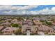 Aerial of neighborhood with mountain views in background at 3234 E Ian Dr, Phoenix, AZ 85042