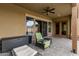 Covered patio with seating area overlooking the backyard at 3234 E Ian Dr, Phoenix, AZ 85042
