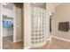 Bathroom with a glass block shower at 3234 E Ian Dr, Phoenix, AZ 85042