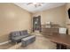 Bedroom with a couch, storage, and workspace at 3234 E Ian Dr, Phoenix, AZ 85042