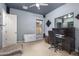 Home office with a desk, chair and dog bed at 3234 E Ian Dr, Phoenix, AZ 85042