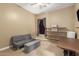 Bedroom with a couch, storage, and workspace at 3234 E Ian Dr, Phoenix, AZ 85042