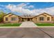 Stunning ranch home with stone accents and landscaped yard at 3234 E Ian Dr, Phoenix, AZ 85042