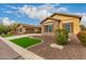 Ranch style home with a well-manicured lawn at 3234 E Ian Dr, Phoenix, AZ 85042
