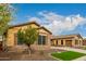 Lovely one-story home with stone and stucco exterior at 3234 E Ian Dr, Phoenix, AZ 85042