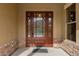 Elegant wood front door with glass inserts at 3234 E Ian Dr, Phoenix, AZ 85042