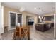 Open kitchen with an island, stainless steel appliances, and granite countertops at 3234 E Ian Dr, Phoenix, AZ 85042