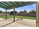 Covered patio overlooking a grassy backyard at 705 W Ivy Cir, Mesa, AZ 85201