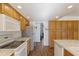 Bright kitchen, featuring ample wood cabinets and modern appliances at 705 W Ivy Cir, Mesa, AZ 85201