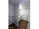 Updated bathroom with white vanity, toilet, and wood-look tile floor at 7434 N 44Th Dr, Glendale, AZ 85301