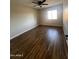 Spacious bedroom with hardwood floors and ceiling fan at 7434 N 44Th Dr, Glendale, AZ 85301