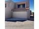 Tan two-story stucco home with attached garage and Spanish tile roof at 7434 N 44Th Dr, Glendale, AZ 85301