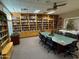 Community library with ample bookshelves and a large conference table at 8500 E Southern Ave # Ofc, Mesa, AZ 85209