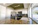 Modern kitchen featuring stainless steel appliances and granite countertops at 9330 E Kalil Dr, Scottsdale, AZ 85260