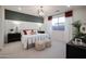 Elegant main bedroom with a statement wall, plush bedding, and modern lighting at 14582 W Valentine St, Surprise, AZ 85379