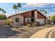 House exterior showcasing a clean, desert landscape design at 17638 N 36Th Ave, Glendale, AZ 85308